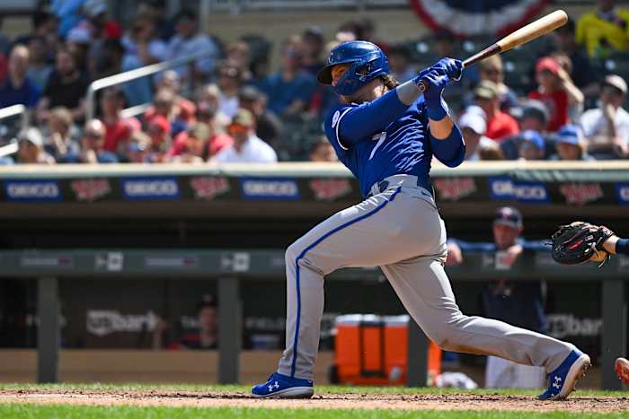 May 28, 2022; Minneapolis, Minnesota, USA; Kansas City Royals shortstop Bobby Witt (7) hits his third double of the game against the Minnesota Twins during the seventh inning at Target Field. Mandatory Credit: Nick Wosika-USA TODAY Sports